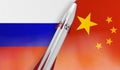 Nuclear missile of Russia and China on flags background