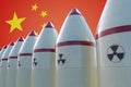 Nuclear missiles and Chinese flag in background. 3D rendered illustration