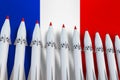 Nuclear missiles in a row and flag of France