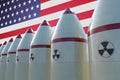 Nuclear missiles and USA flag in background. 3D rendered illustration