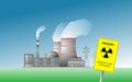 Nuclear power plant against a clear blue sky. Radiation hazard sign Royalty Free Stock Photo