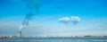 Nuclear power plant blue sky clouds harbor Royalty Free Stock Photo