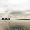 Nuclear power plant on the coast. Ecology disaster concept. Royalty Free Stock Photo