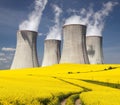 Nuclear power plant Dukovany with golden flowering field