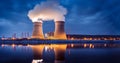 Nuclear power plant after sunset. Dusk landscape with big chimneys. cooling towers, power station Royalty Free Stock Photo