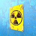 Nuclear site, sign hanging on a blue wall. Indication of the presence of a radioactive area