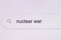 Nuclear war - Internet browser search bar typing hypotetical world conflict text. Typing the word Nuclear war in the Royalty Free Stock Photo