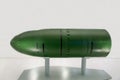 The nuclear warhead of the torpedo is green on a white background. Military equipment atom planes