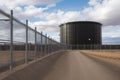 nuclear waste storage tank, surrounded by high security fence and cameras Royalty Free Stock Photo