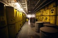 nuclear waste, with warning signs and fences, stored in secure underground facility Royalty Free Stock Photo