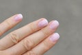 Nude, beige gel extended manicure on the nails Royalty Free Stock Photo