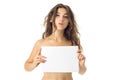 Nude brunette girl with placard Royalty Free Stock Photo
