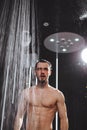 Nude brutal guy is going to take a shower . cool down in shower.cool head Royalty Free Stock Photo