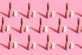 Nude matte lipstick with a cap on a pink background. Female accessory for lip makeup pattern Royalty Free Stock Photo