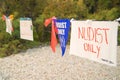 Nudists only hand made sign on beach Royalty Free Stock Photo