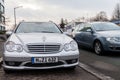 Mercedes Benz car stands on a parking stripe