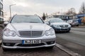 Mercedes Benz car stands on a parking stripe