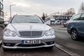 Mercedes Benz car stands on a parking stripe