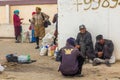 NUKUS, UZBEKISTAN - APRIL 21, 2018: Local people waiting at the station of shared cars in Nukus, Uzbekist