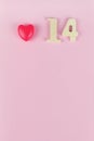 Number 14 Against Pink Wall. Valentine`s day concept. Date 14 February