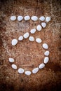 '3' number alphabet made form white stone