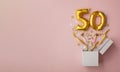Number 50 birthday balloon celebration gift box lay flat explosion Royalty Free Stock Photo