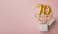 Number 70 birthday balloon celebration gift box lay flat explosion Royalty Free Stock Photo