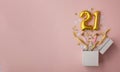 Number 21 birthday balloon celebration gift box lay flat explosion Royalty Free Stock Photo