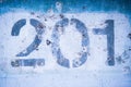 The number 2 0 1 on the blue wall, two hundred and one Royalty Free Stock Photo