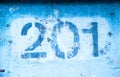 The number 2 0 1 on the blue wall, two hundred and one Royalty Free Stock Photo