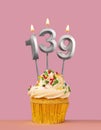 Number 139 candle with cupcake - Birthday card Royalty Free Stock Photo