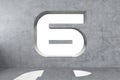 Number 6 is carved into a concrete wall Royalty Free Stock Photo