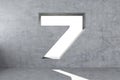 Number 7 is carved into a concrete wall Royalty Free Stock Photo