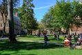 Students of prestigious Harvard University, MA, seen walking between lectures.