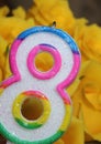 Number eight on yellow background Royalty Free Stock Photo