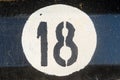 Number eighteen on the metall plate Royalty Free Stock Photo