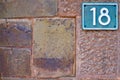 Number 18, eighteen, number on a wall, offset. Large text space. Royalty Free Stock Photo