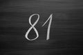 Number eighty one enumeration written with a chalk on the blackboard Royalty Free Stock Photo
