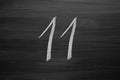 number eleven enumeration written with a chalk