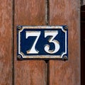 enameled house number 73