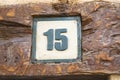 Number Fifteen on Wall Royalty Free Stock Photo