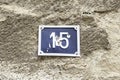 Number fifteen on a wall of a house Royalty Free Stock Photo