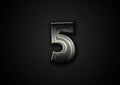 The number five in black textured background