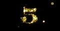 Number five glitter gold. Golden glittering number 5 with glister light and shiny sparks black background Royalty Free Stock Photo