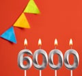 Number of followers or likes - Candle number 6000 Royalty Free Stock Photo