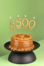 Number of followers or likes - Candle number 6500 Royalty Free Stock Photo