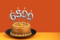 Number of followers or likes - Candle number 6500 Royalty Free Stock Photo