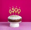 Number of followers or likes - Candle number 6500 Royalty Free Stock Photo