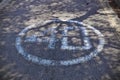 Number forty in a circle painted in white on a the street Royalty Free Stock Photo