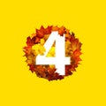 Number four in the circle frame of colorful autumn maple leaves isolated on yellow Royalty Free Stock Photo